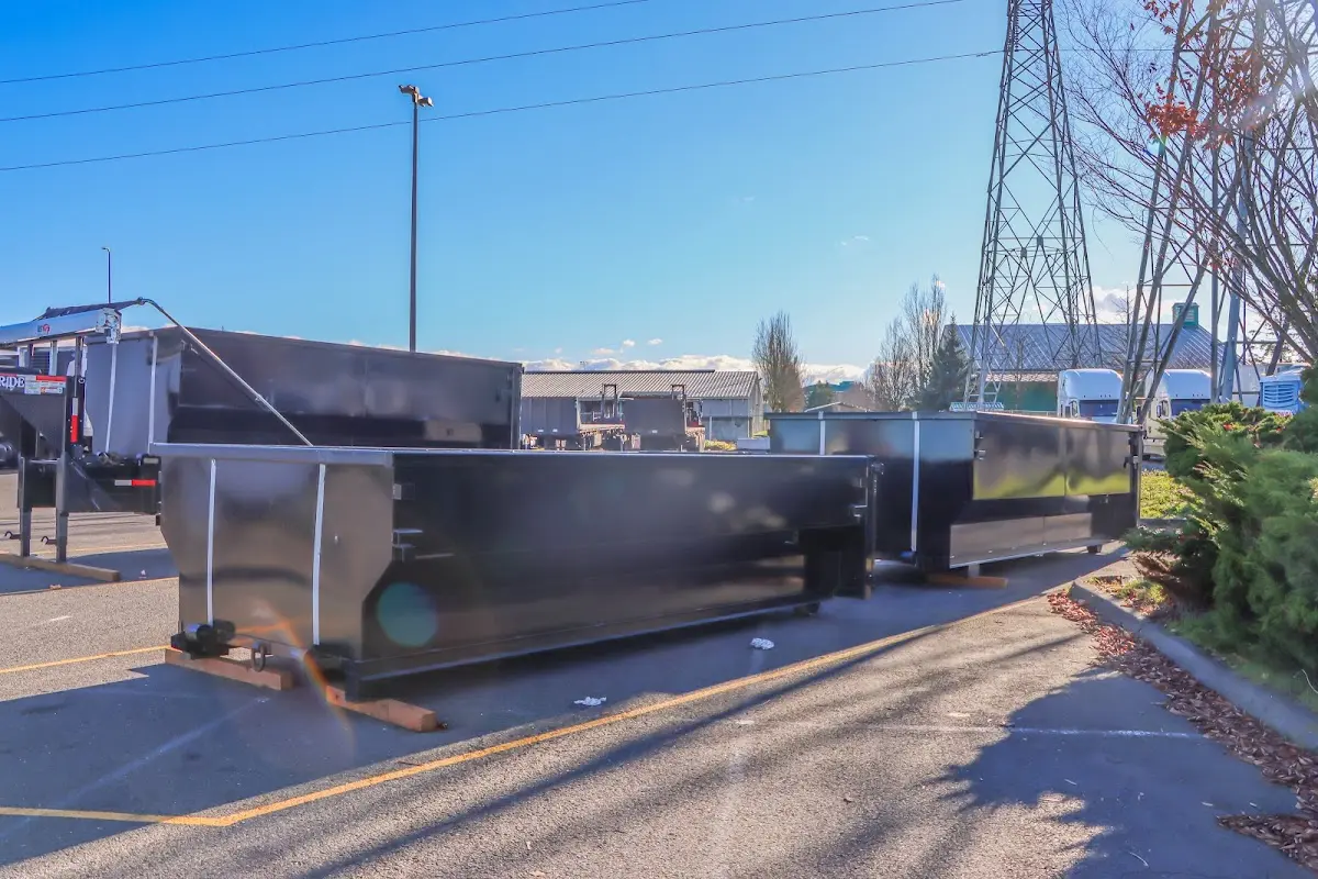 Roll-off dumpster ready for waste disposal at job site for Construction Dumpster Rental in North Logan